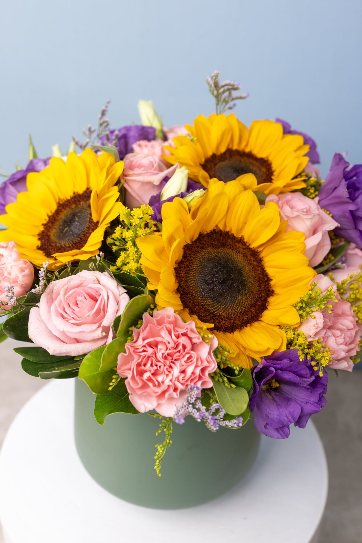Cascade - Sunflower, Rosa Clarita, Pink Carnation and Lisianthus