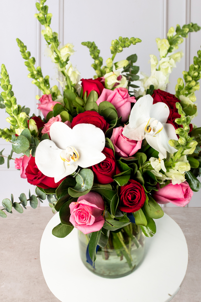Latido - Arreglo de Rosas Rojas y Rosas con Orquídea Cuau. Izc.