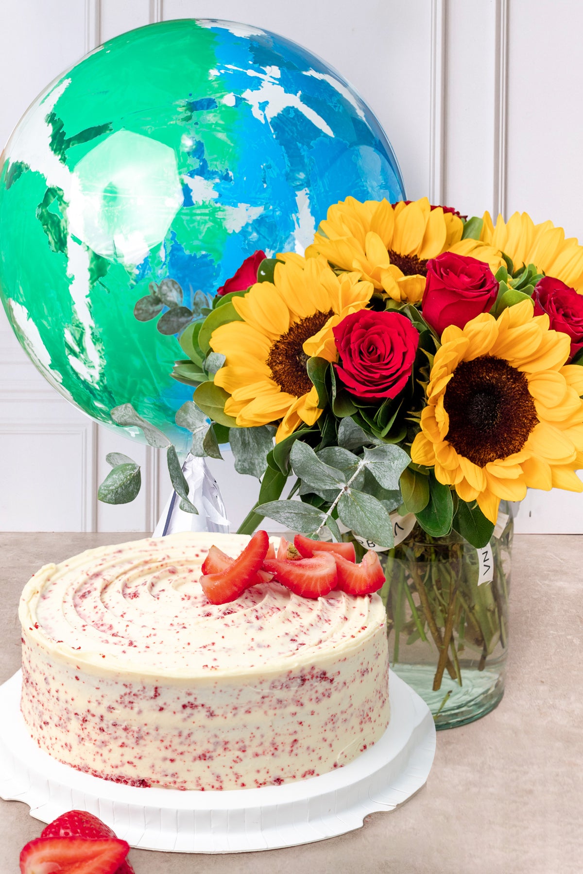 Sunset - with Large Red Velvet Cake and Blue and Green Balloon Explosion
